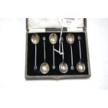 A set of early 20th century silver coffee bean spoons