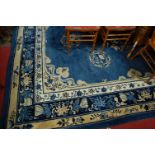 A Chinese Superwash blue ground carpet, having multiple trailing borders, 283 x 354cm