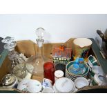 A single box of various glass and china wares to include cranberry glass jug, decanters, Crown Devon