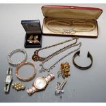 A box of miscellaneous costume jewellery to include filigree and paste set brooch with matching