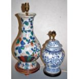 A modern porcelain table lamp base of slender baluster form decorated with flowers, height 42cm (