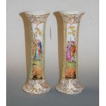 A pair of late 19th century Dresden porcelain vases, of inverted cylindrical form, each reserve