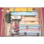 A single box of 0 gauge tinplate railway buildings, track, and further accessories