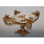A late 19th century continental centrepiece having enamelled bowl with brass swan neck handles to