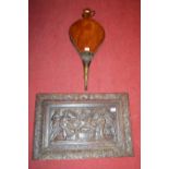 A 19th century carved oak wall hanging depicting nativity scene, formerly cupboard door together