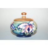 A Moorcroft Hibiscus pattern bowl, with replacement wooden cover, impressed Moorcroft Made in