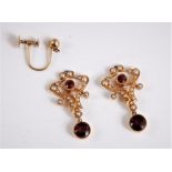 A pair of 15ct gold early 20th century seed pearl and garnet earrings, the round garnets, collet