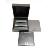 A cased pair of Dunhill silver shirt collar inserts, in original presentation box, outer box and