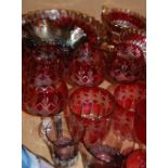 A box of miscellaneous glassware, to include ruby overlaid glass goblets, amethyst carnival glass