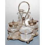 An Edwardian silver four bottle cruet stand, h.12cm