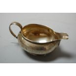 A silver cream jug, 5oz, maker E&D Co, Birmingham 1925, w.15cm