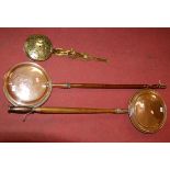 Two 19th century copper warming pans together with decorative pierced brass chestnut roaster