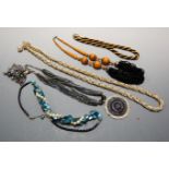 A large collection of costume jewellery to include beaded necklaces etc