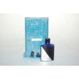 A small bottle of Bourjois Evening in Paris perfume, in blue bakelite case in the form of a door