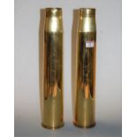 A pair of WWII brass shell cases each dated 1943, height 44cm