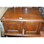 A 1920s oak canteen case only, having three blue velvet lined drawers with recessed brass handles,
