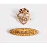 A 15ct diamond set oval brooch, 39mm long, together with a 15ct split pearl set dove and heart