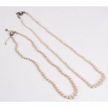 A graduated cultured pearl necklace with a diamond set clasp, the graduated cultured pearls, approx.