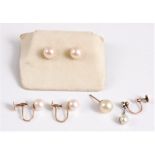 A pair of 7mm diameter cultured pearl earstuds with 9ct screwback fittings, together with another