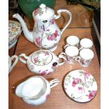 An Aynsley four place setting coffee service in the Elizabeth Rose pattern