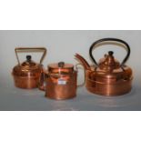 An early 20th century copper quick-boiling kettle; together with two other copper kettles (3)