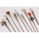 Ten hat/hair pins with agate and jade tops and Eastern white metal style decoration, approx. 16cm