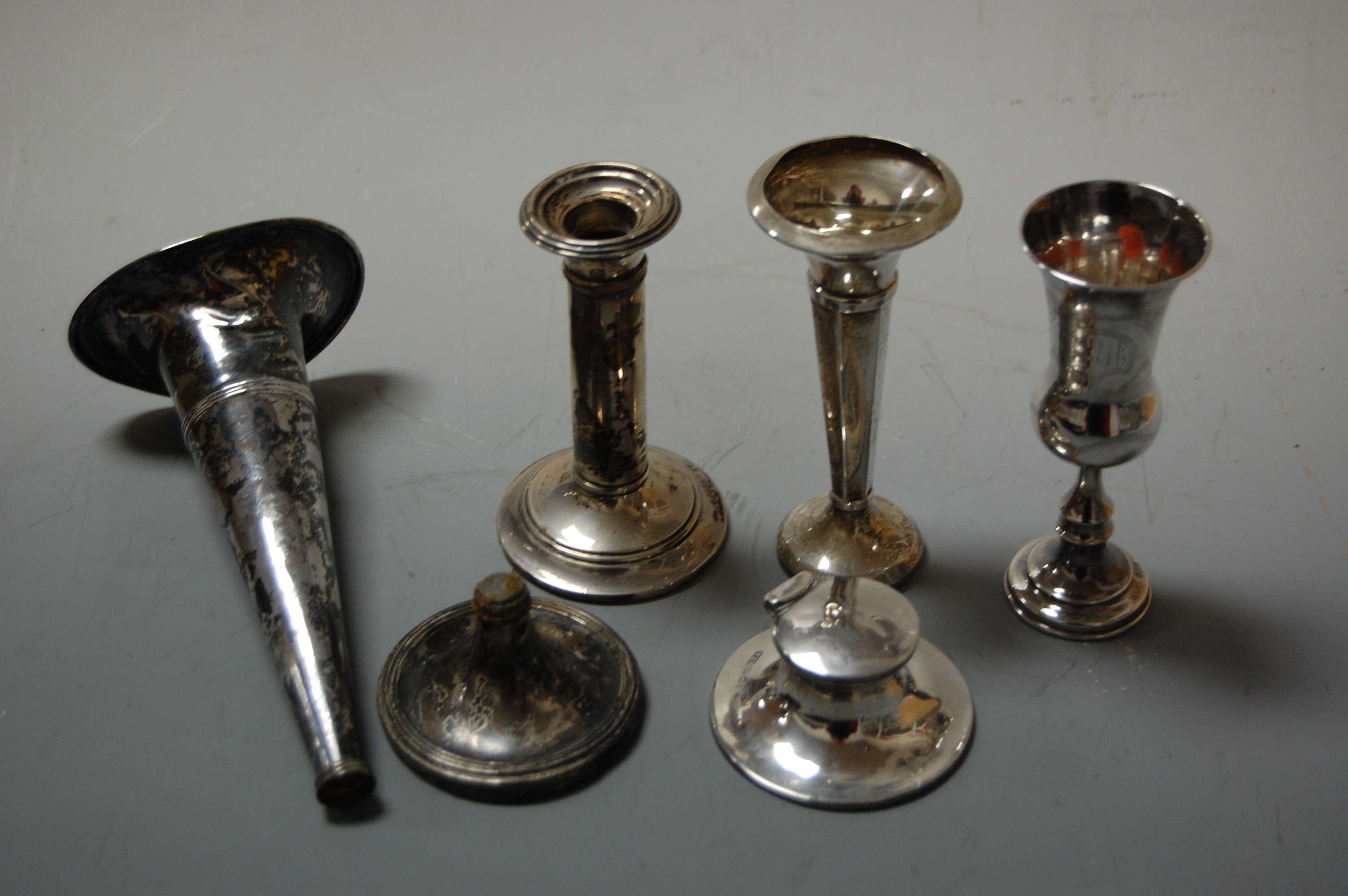 Assorted silver wares, to include kiddush cup, specimen vases ( one a/f), single candlestick on