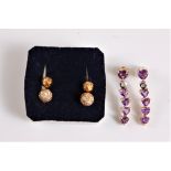 A pair of 14ct amethyst and diamond earrings, the trillion cut amethyst set below with a single
