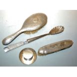Two silver backed brushes; and a silver and glass handled salad server (NOTE DESK WEIGHT WITHDRAWN)