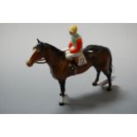A Beswick model of a bay thoroughbred with jockey up, No. 1862, h.19cm
