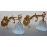 A pair of circa 1900 lacquered brass single sconce wall light fittings each having vaseline