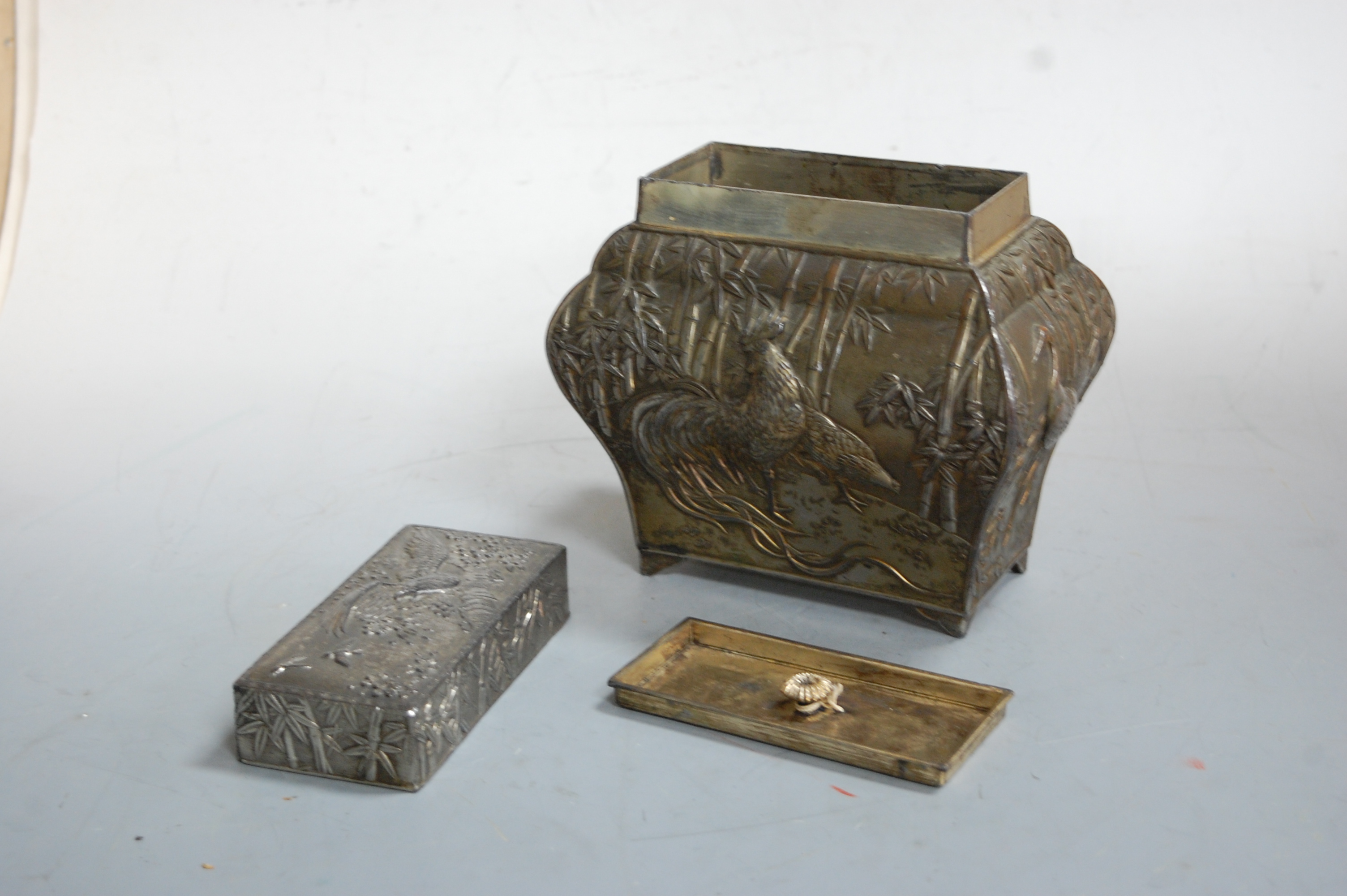 An early 20th century Chinese silver plate on copper tea caddy, of bombe form, relief decorated with - Image 2 of 5