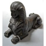 An Egyptian Revival bronzed metal sphinx after the great sphinx of Giza h.15cm