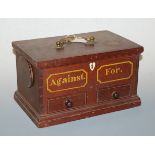 A 19th century mahogany ballot box, of rectangular form, having removable cover to each side, the