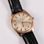 A gentleman's Omega Automatic wristwatch, the round dial with black and gilt baton numerals, gilt