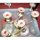 A pair of silver plated three sconce table candelabra; together wih two silver plated trays