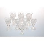 Assorted principally 19th century wine glasses, each having conical bowls, some with knopped stems