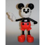A large painted wooden model of Disney's Mickey Mouse, h.46cm