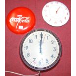 A mid century enamelled Smiths electric clock together with a bakelite Smiths clock, and a Coca Cola