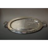 A Mexican white metal twin handled oval tray, stamped Sterling 925, 30oz, w.49cm