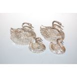 A pair of cut glass and silver mounted table salts, modelled as swans; together with a smaller