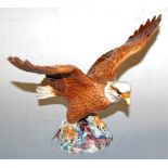 A Beswick bald eagle, No.1018, h.19.5cm (restored to wing tips)
