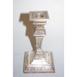 A Victorian silver dwarf table candlestick in the neo-classical style having a removable sconce to