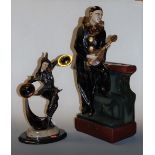 A large resin figure of Pierrot, in standing pose with instrument in hand, h.56cm; together with