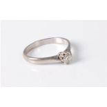 An 18ct diamond solitaire ring, the round brilliant cut diamond, estimated approx. 0.25cts, claw