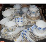 A Tuscan Fine English Bone China part tea service; together with a Windsor China part tea service;
