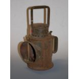 An early 20th century green painted railway hand lantern