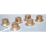 A set of six modern silver place setting holders, each in the form of a top-hat, maker E & J,