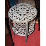 A contemporary cast and pierced metal circular floral decorated two-tier garden occasional table,