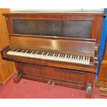C. Bechstein - an early 20th century walnut cased upright piano, iron framed and overstrung, width